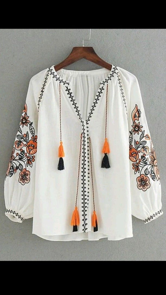 Trendy White long top-tunics with embroidery work for women